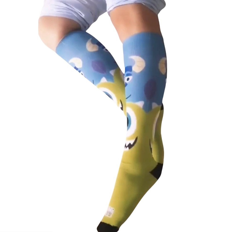 Media Compresión Monster Inc blue and green