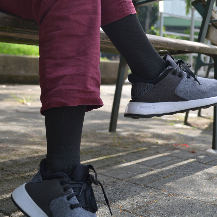 Media larga de compresión negra